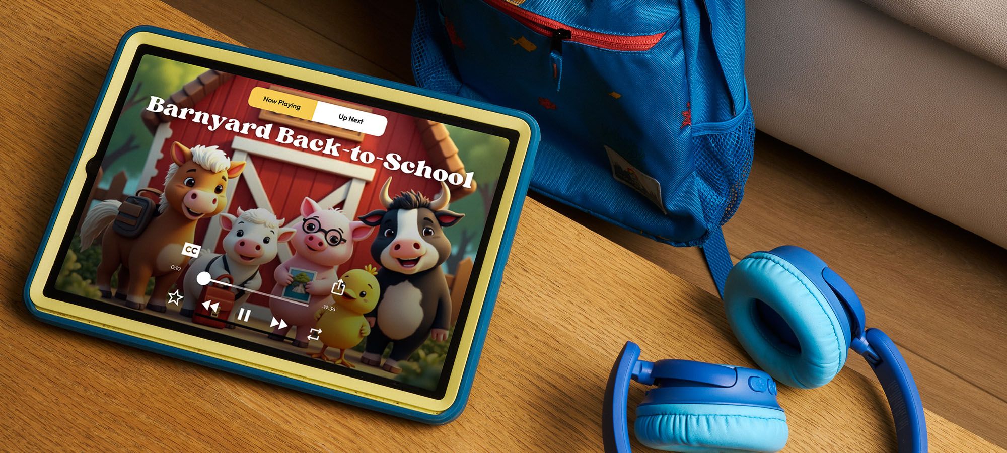 Tablet shows “Barnyard Back-to-School” story with cartoon farm animals.