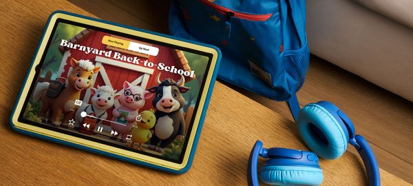 Tablet shows “Barnyard Back-to-School” story with cartoon farm animals.